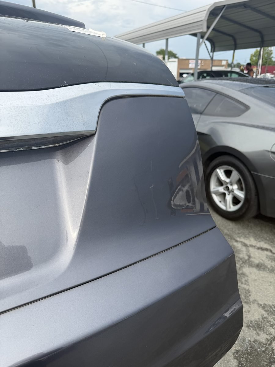 The same rear quarter panel after paintless dent repair